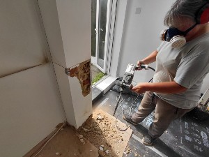 Removal of salt contaminated plaster during Carshalton damp proofing work