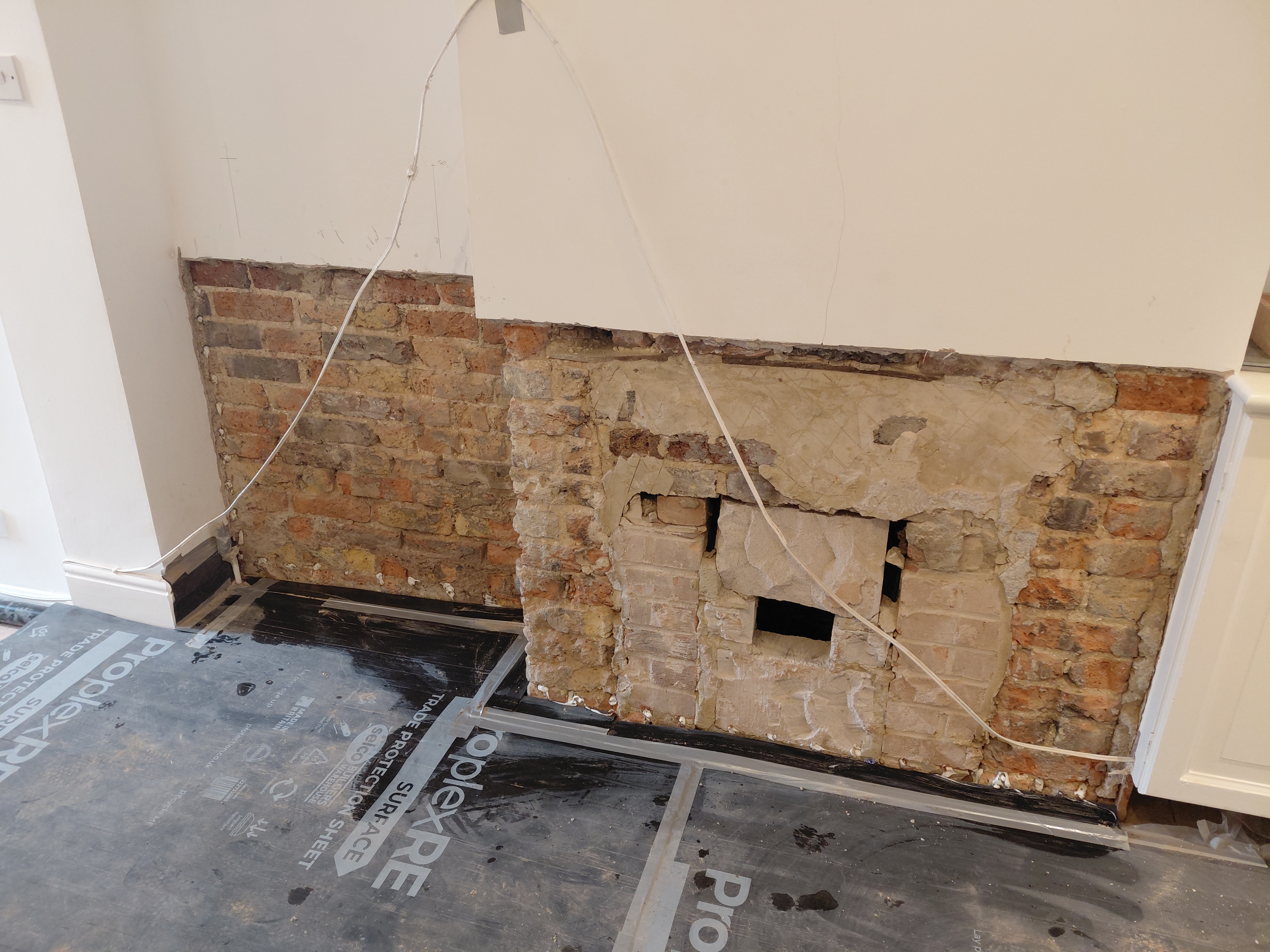 Masonry wall preparation for damp proof course in Carshalton SM5