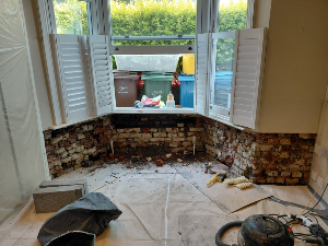 Damp walls before DPC installation
