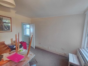 Damp affected wall before treatment in Reigate Surrey RH2